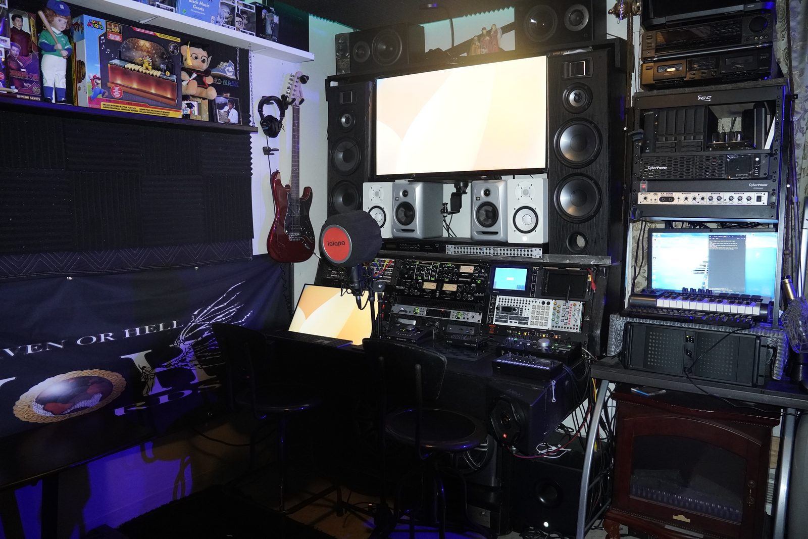 Studio gear wall under blue mood lighting